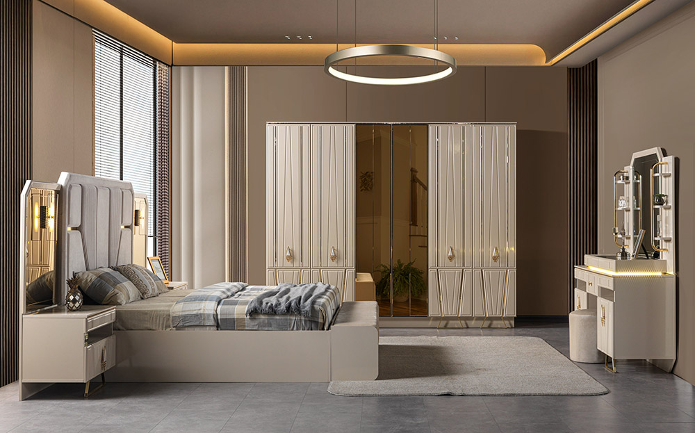 Luxurious modern bedroom with a large upholstered bed, mirrored wardrobes, and a white vanity against beige walls.