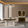Luxurious dining room with a white and gold table cream chair and a circular ring pendant light overhead