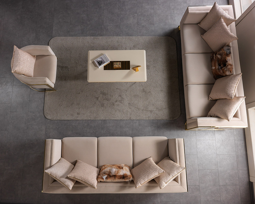 Anka Living Room 8 Armonna Top down view of a modern beige living room with cream sofas cushions a central coffee table and a gray rug