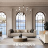 Luxurious living room with beige sofas arched windows overlooking a lake and a crystal chandelier