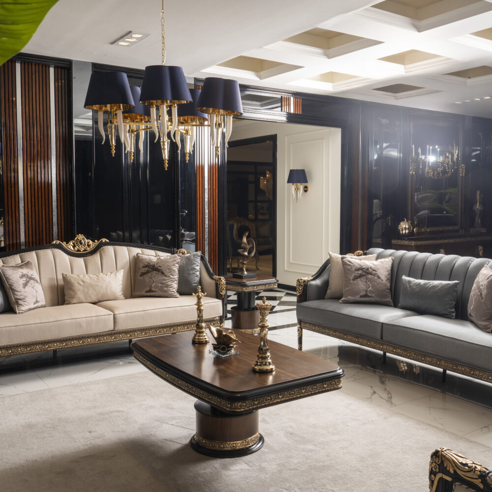 Luxurious living room with gilded carved sofas, black glossy walls, and a marble floor.