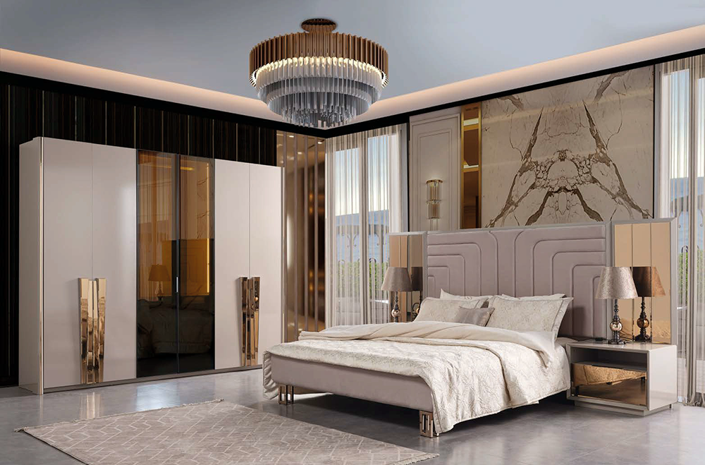 Luxurious bedroom with a plush upholstered bed, marble wall, and large white wardrobe with mirrored doors.