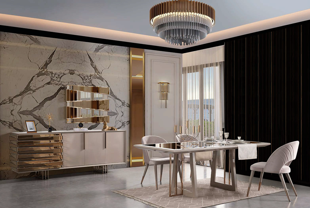 Luxurious modern dining room with a marble wall, gold accents, and a glass dining table set for four under a circular chandelier.