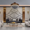 Luxurious modern living room with a marble feature wall black sofa white armchairs and gold accents
