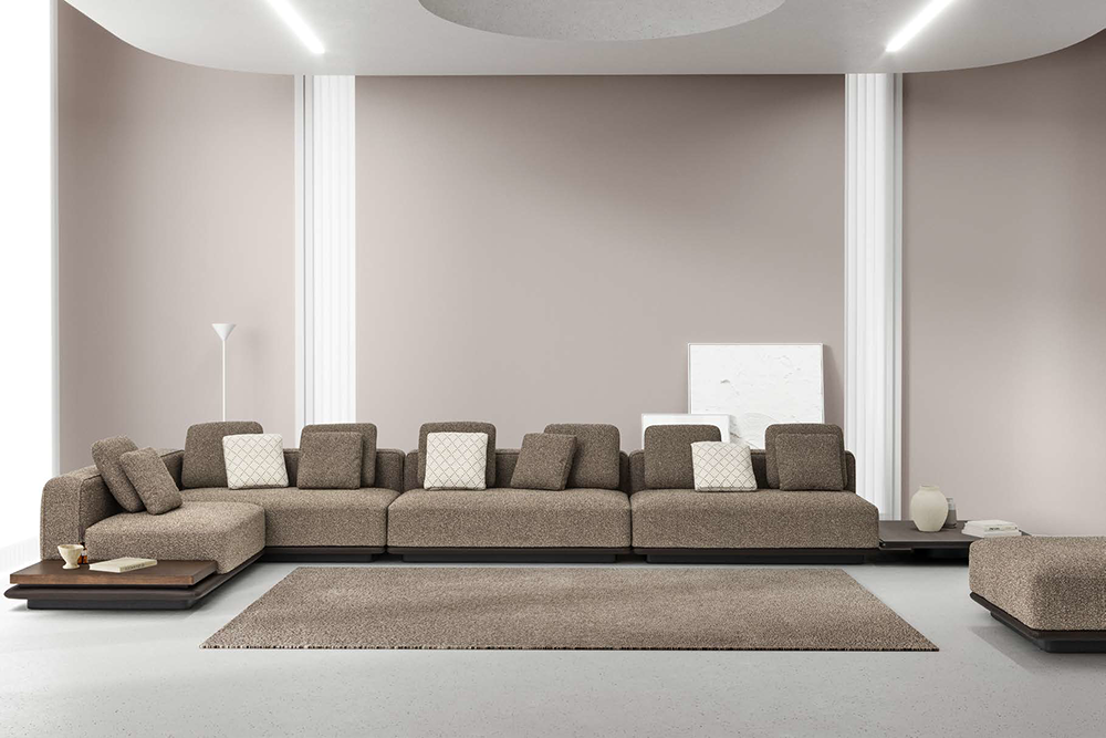 Cloud Corner Sofa 5 Armonna Contemporary brown modular sectional sofa with matching cushions in a neutral living room with a beige rug