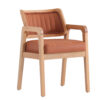 Wooden armchair with a light oak frame and orange brown leather cushions on seat and backrest