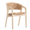 Wooden armchair with orange and white patterned upholstery