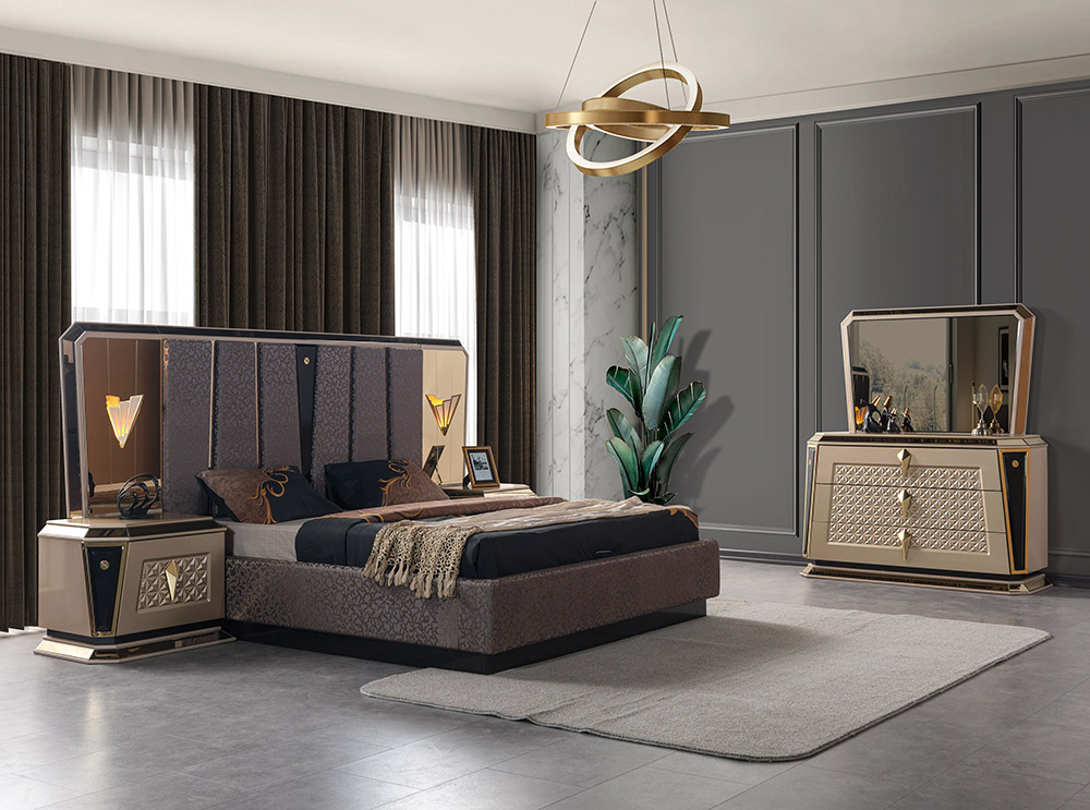 Luxurious modern bedroom with a large upholstered bed, gold headboard frame, matching nightstands, and a dresser with a mirror against dark paneled walls.