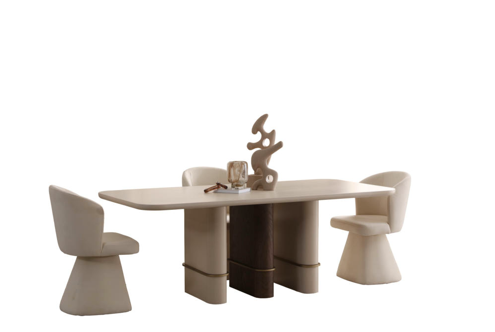 Modern white rectangular dining table with curved pedestal legs, surrounded by four beige chairs; decorative sculpture centerpiece on the table.
