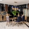 Emirgan Classic Set 1 Armonna Luxurious dining room with a gold ornate table and blue velvet chairs a blue shaded chandelier and mirrored cabinets