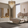 Luxurious bedroom with scalloped beige upholstered headboard crystal chandelier and mirrored wardrobe