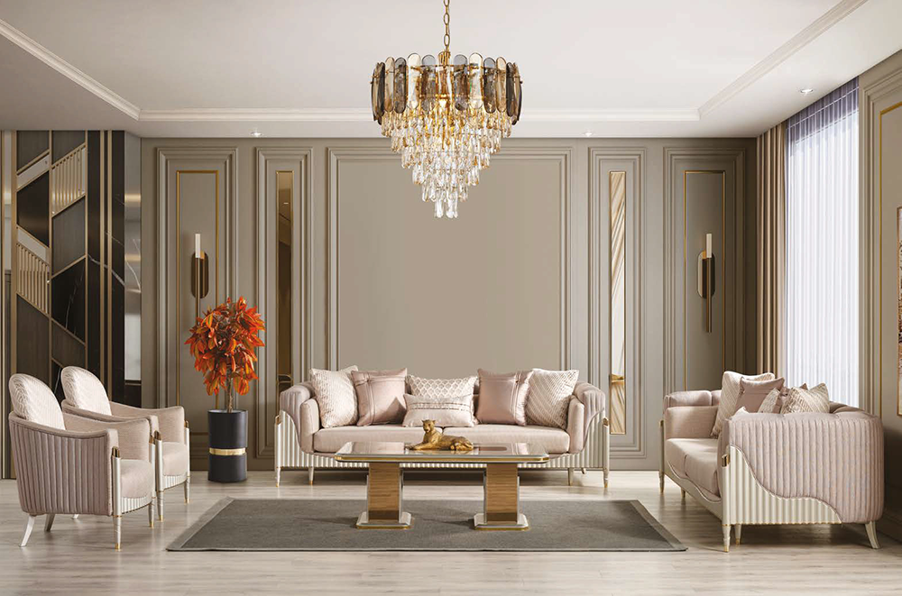Luxurious beige living room with gold trimmed walls crystal chandelier and cream upholstered seating around a glass coffee table