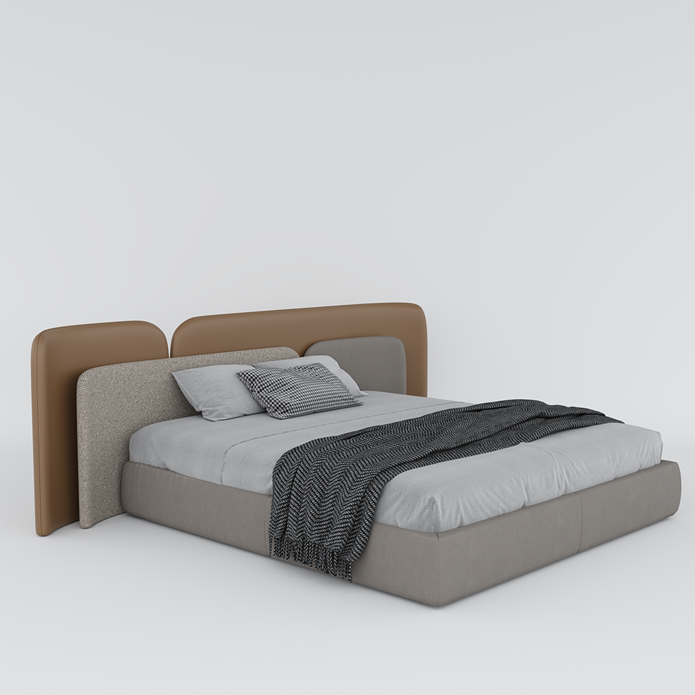 Modern upholstered platform bed with a tan curved headboard and layered gray bedding with a textured throw blanket.