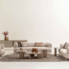 Neutral living room with cream sectional sofa matching armchairs round coffee tables and a gray rug in a bright minimalist space