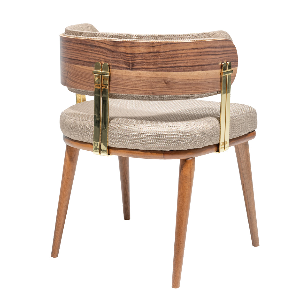 Wooden mid century chair with beige upholstered seat and curved backrest brass hardware and tapered legs