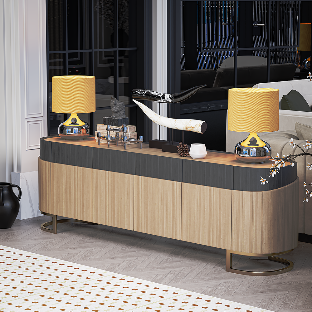 Modern dark-wood and light-wood credenza with two yellow-shaded lamps and decorative accents in a stylish living room setting