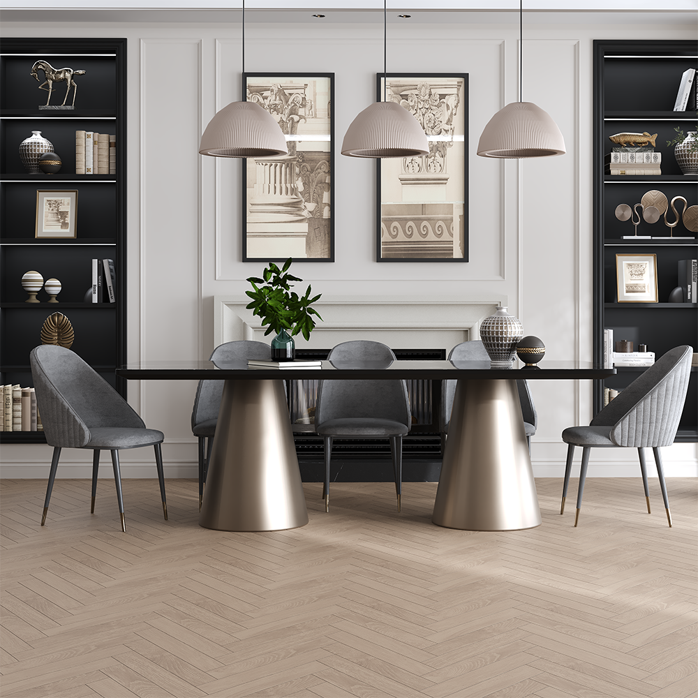 Contemporary dining room with a black glass table and gold cone bases, six gray upholstered chairs, pendant lights, and built-in dark bookshelves.
