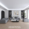 Modern living room showroom with gray sectionals black builtin shelves a white fireplace and a herringbone wood floor