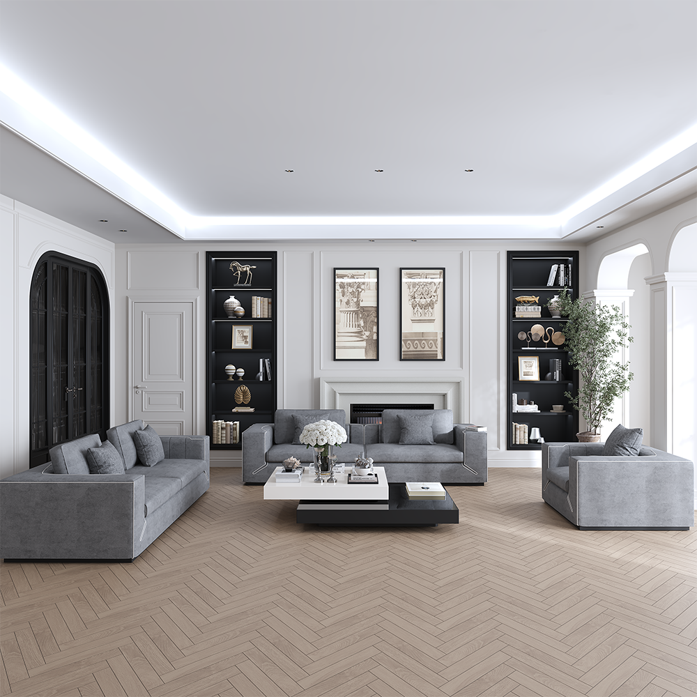 Modern living room with gray sofas, a black-framed fireplace wall, and built-in bookshelves flanking a center art display