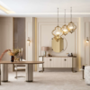 Luxurious beige living and dining room with a round table cream chairs and sculptural pendant lights above a round mirror