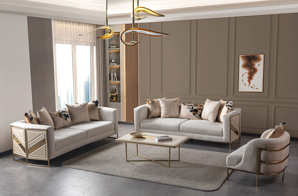 Modern living room with two cream sofas a matching armchair gold metal frames and a rectangular coffee table on a light gray rug in a neutral scheme