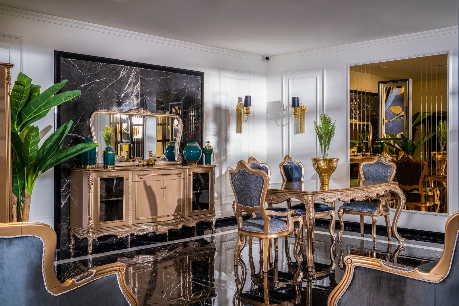 Napoli Classic Set 11 Armonna Luxurious dining room with gold accented furniture blue upholstered chairs teal vases and a carved table set against a black marble wall