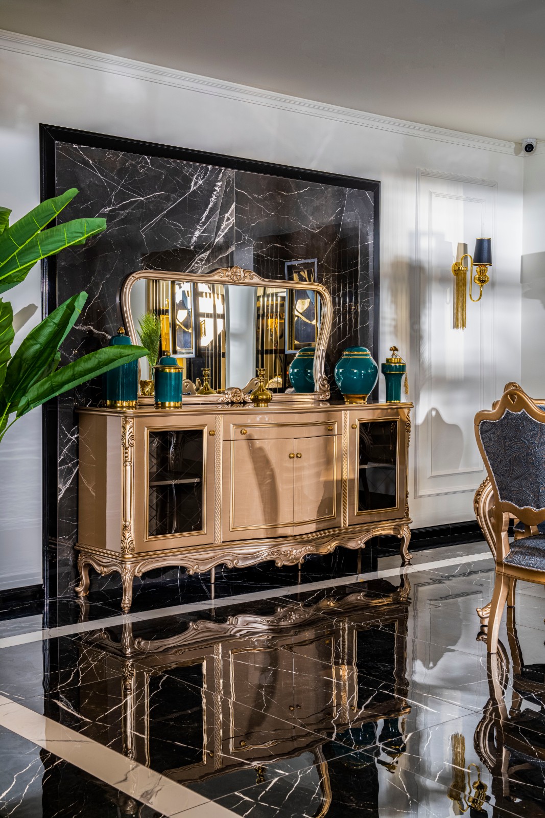 Napoli Classic Set 16 Armonna Ornate gold sideboard with a large mirror teal vases and decorative items against a black marble backdrop