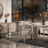 Luxurious modern dining room with a round ivory table matching chairs and a sideboard beneath a circular mirror