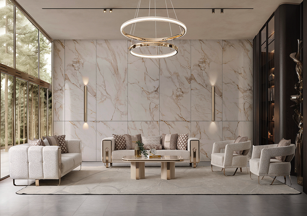 Luxurious modern living room with cream sofas marble paneled wall and circular pendant lights above a central coffee table