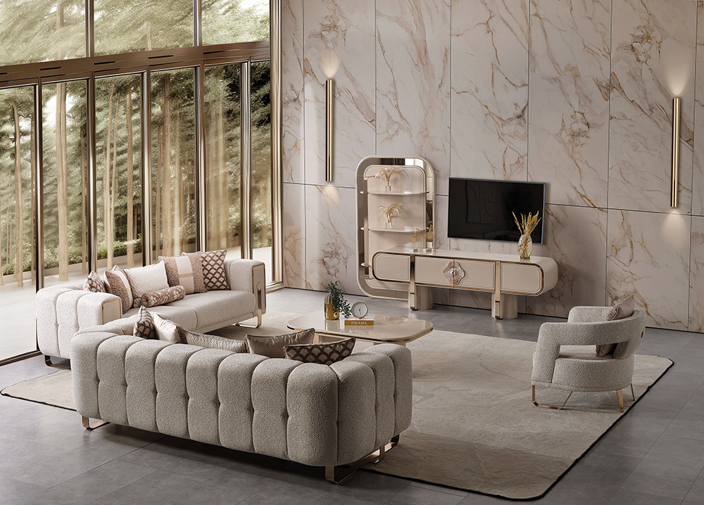 Luxurious living room with a tufted gray sectional matching chairs marble walls and a wall mounted TV on a beige console