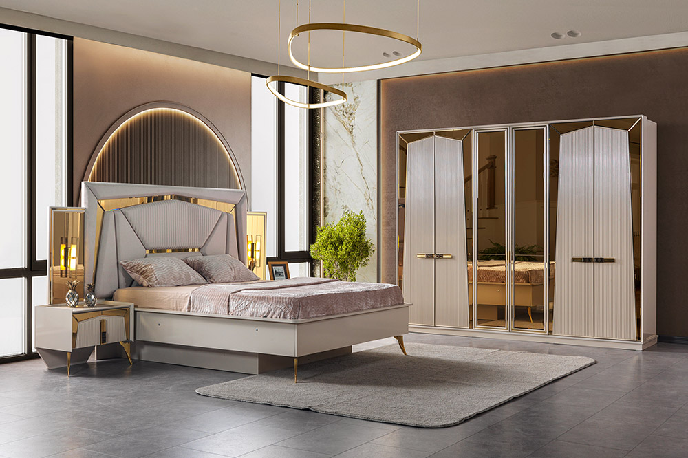 Luxurious modern bedroom in a showroom: upholstered bed, matching nightstands, gold accents, and a large mirrored wardrobe.