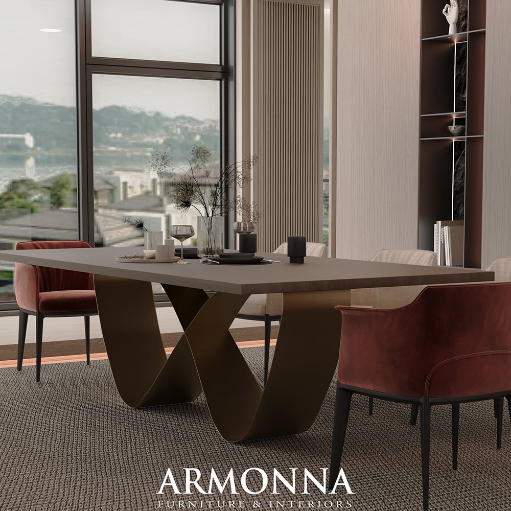 Modern dining room with a sculptural brown X-base table, red velvet chairs, and a large window with city views.
