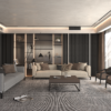 Modern living room with two neutral sofas a black shelving wall and a large coffee table under soft ambient lighting floor to ceiling windows load the right side