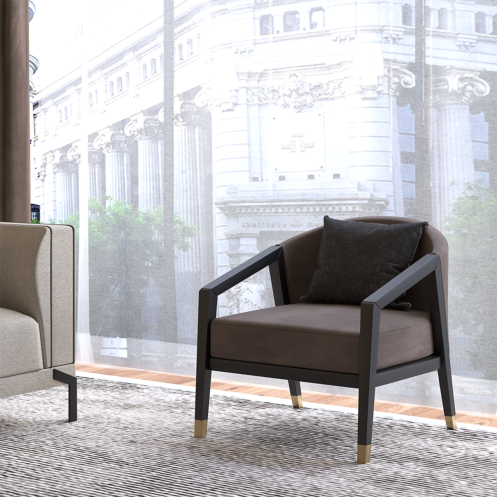 Brown armchair with a black metal frame and gold-tipped legs sits on a striped rug by a large window; a beige sofa is to the left, with a city street visible outside.