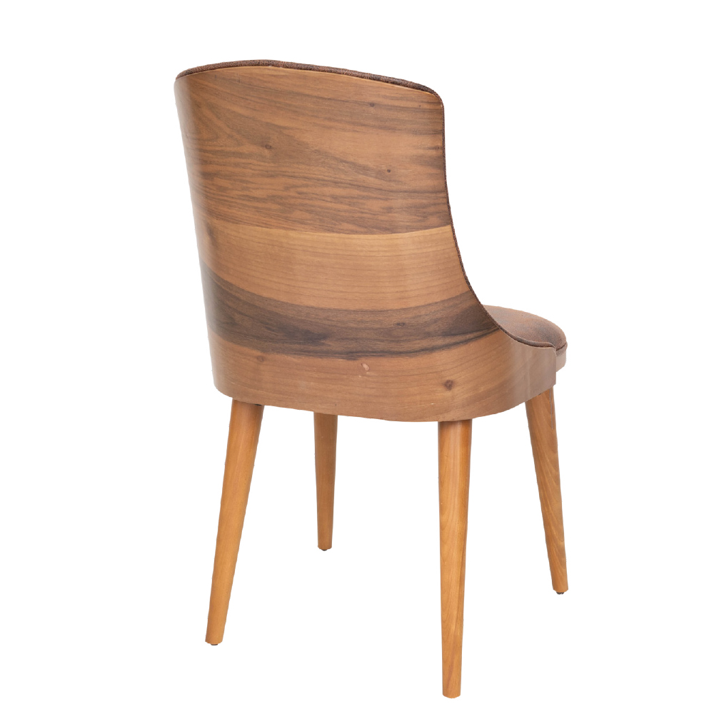 Wooden chair with curved backrest and tapered legs photographed from the side against a white background