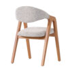 Wooden dining chair with light beige upholstered seat and curved backrest