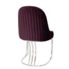 Burgundy velvet upholstered chair with vertical stitching and a chrome curved pedestal base