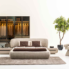 Modern minimalist bedroom showroom with a beige upholstered bed matching wardrobes and a light rug