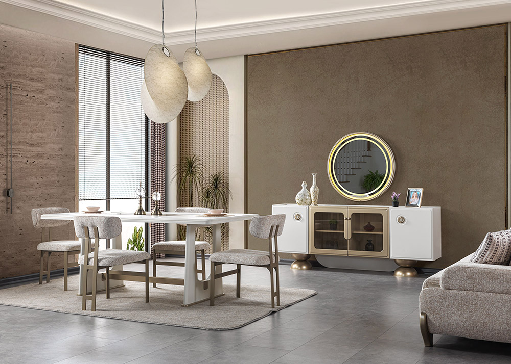 Modern dining room with a white oval table, upholstered chairs, and a beige rug under a stylish pendant light. A white sideboard with a round backlit mirror sits on a taupe wall.