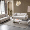 Turkuaz Living Room 1 Armonna Modern living room with two beige fabric sofas an armchair a white coffee table and a light gray rug