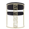 Gold tone framed bar stool with black velvet cushions and a geometric lattice back circular base design