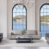 Luxurious living room with three tall arched windows sea view and neutral sofas around a central coffee table