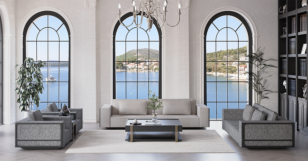 Luxurious living room with three tall arched windows, sea view, and neutral sofas around a central coffee table.