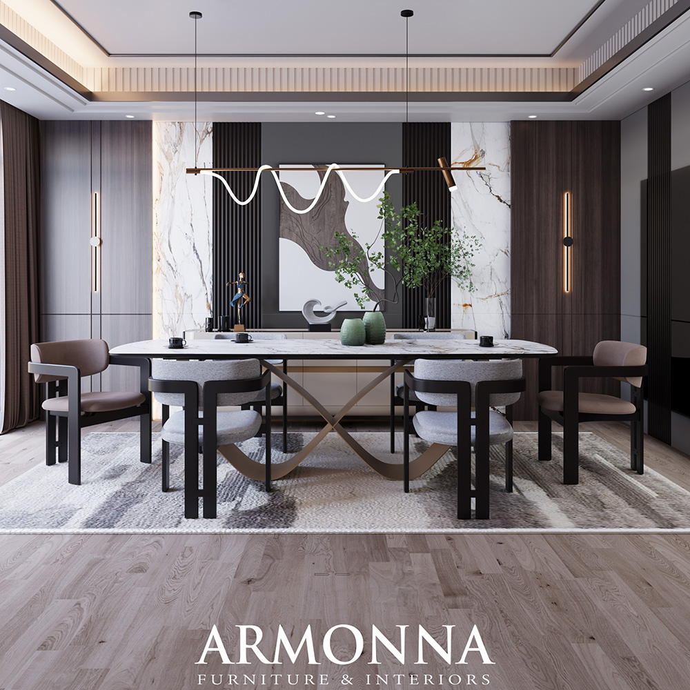 Modern dining room with an oval marble table, six upholstered chairs, a gold sculptural base, greenery, and abstract wall art.