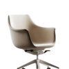 Beige ergonomic swivel office chair with five wheel base on a white background viewed from the sideangled view