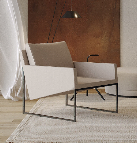 Modern beige lounge chair with a metal frame in a minimalist living room, beside a light rug and brown wall panel behind.