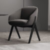 sirus Armonna Gray upholstered lounge chair with black angled legs in a minimal office corner of a neutral room