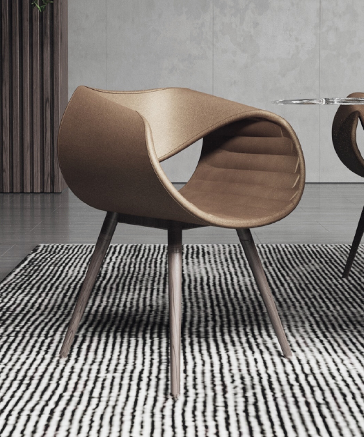 Brown molded lounge chair with wood legs on a striped rug in a modern interior space.