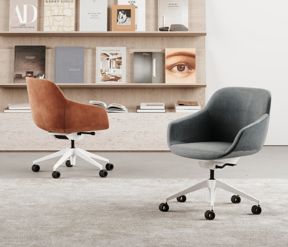 summeroffice Armonna Two swivel office chairs on wheels in a minimalist room with a magazine filled wall shelf behind them